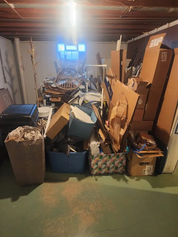 Roll-off dumpster container at job site for Roll Off Dumpster Rental in Riverdale